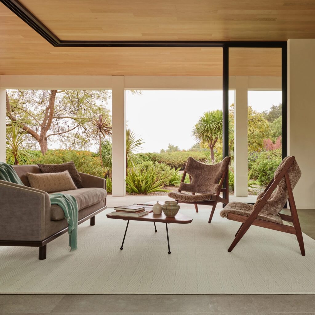 Modern NYC living room featuring an Ernesta rug highlighted in our guide to affordable rugs in NYC.