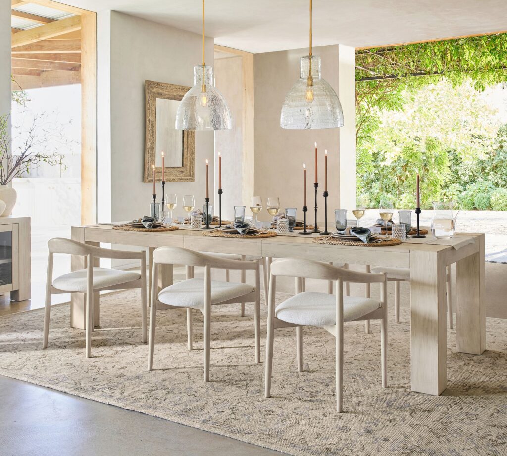 Pottery Barn dining chairs with durable foam and upholstery around a regtangular dining table.