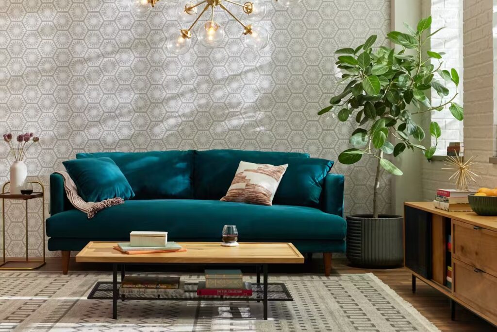 Jewel-toned sofa styled in a refined modern living room