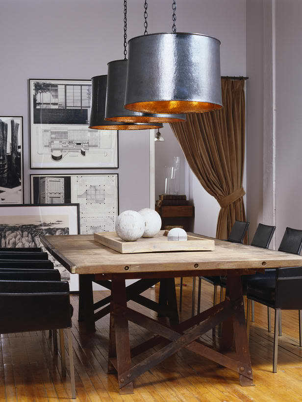 Dining room light fixture centered directly over the table for a balanced layout.